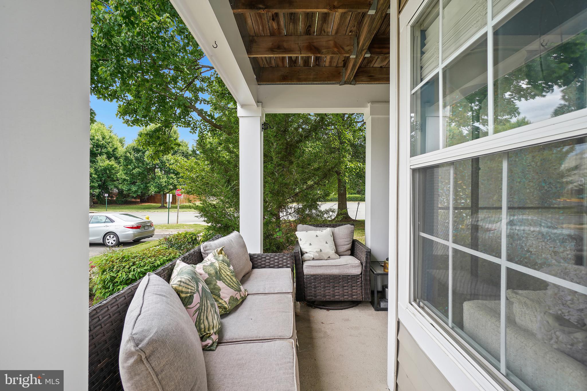 14151 Cuddy Loop, Unit 101 Woodbridge, VA 22193 - Photo 25 of 45 a view of a porch with furniture