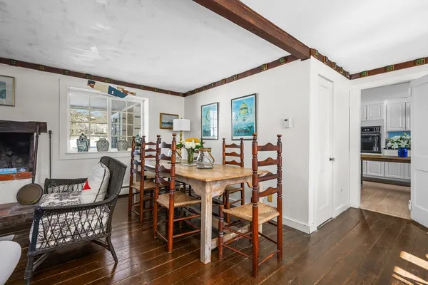 wooden floor with red door