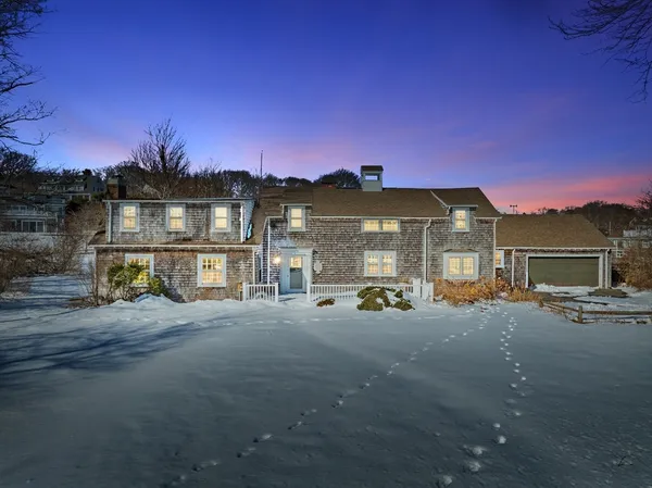 a view of a street with a building in the background
