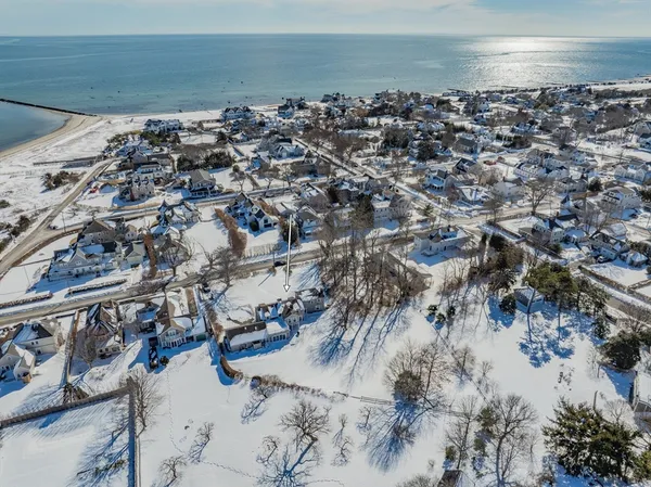 a view of a swimming pool and lounge chair