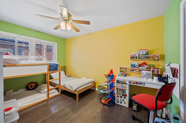 a room with toys and dresser