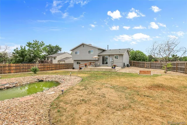 a view of house with outdoor space