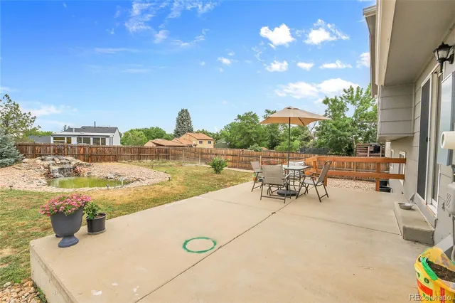 a view of a terrace with chairs