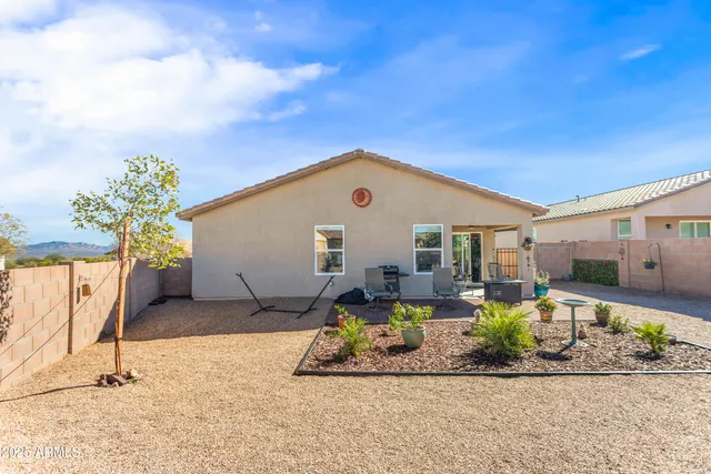 a front view of a house with a outdoor space