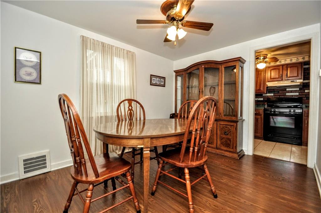 1944 Bower Hill Road Pittsburgh, PA 15243 - Photo 11 of 23 a view of a dining room with furniture window and wooden floor