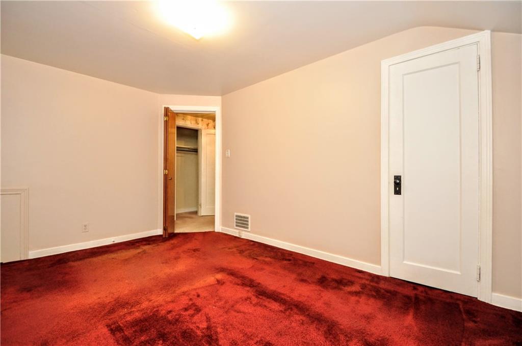 1944 Bower Hill Road Pittsburgh, PA 15243 - Photo 19 of 23 an empty room with wooden floor and closet