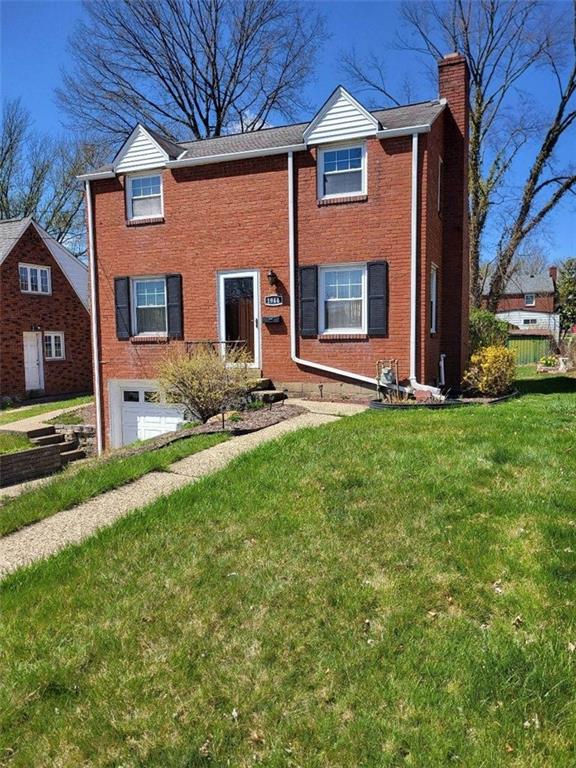 1944 Bower Hill Road Pittsburgh, PA 15243 - Photo 2 of 23 a front view of a house with a yard and garage