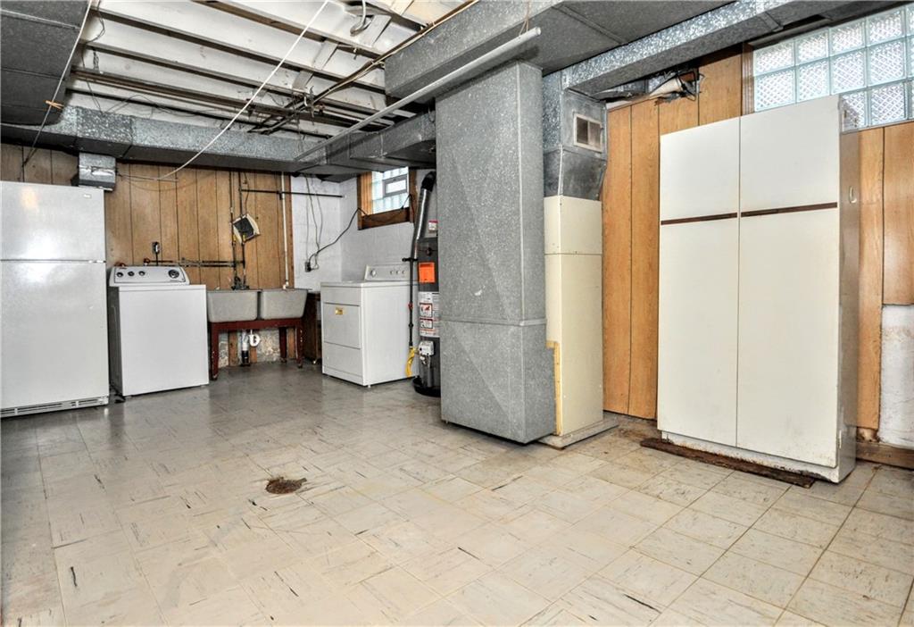 1944 Bower Hill Road Pittsburgh, PA 15243 - Photo 22 of 23 a view of storage and utility room with refrigerator and washer