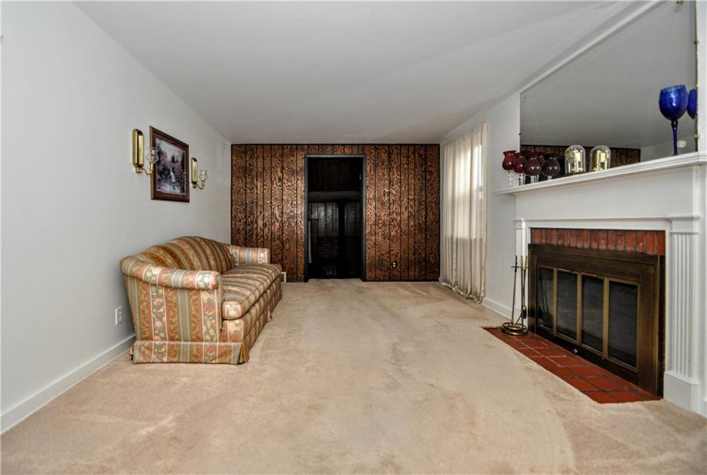 1944 Bower Hill Road Pittsburgh, PA 15243 - Photo 3 of 23 a living room with furniture and a fireplace