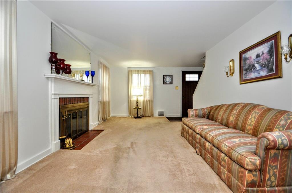 1944 Bower Hill Road Pittsburgh, PA 15243 - Photo 5 of 23 a living room with furniture and a fireplace