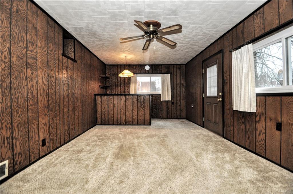 1944 Bower Hill Road Pittsburgh, PA 15243 - Photo 7 of 23 a view of a hallway with wooden floor and chandelier