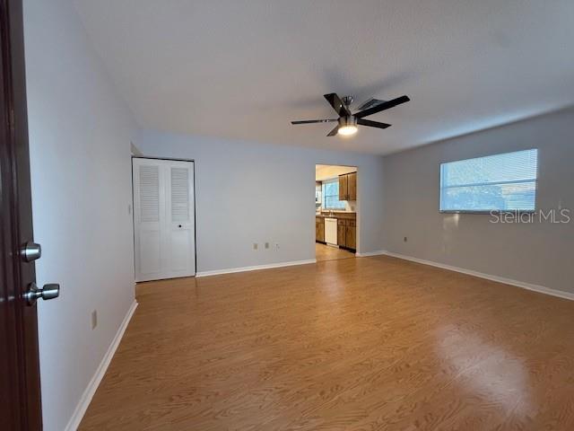 1029 10th Street Northwest, Unit A Largo, FL 33770 - Photo 3 of 21 a view of a livingroom with a ceiling fan and window