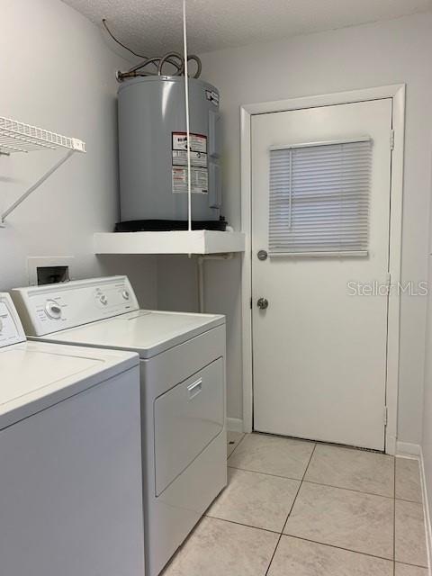 1029 10th Street Northwest, Unit A Largo, FL 33770 - Photo 9 of 21 a utility room with dryer and washer