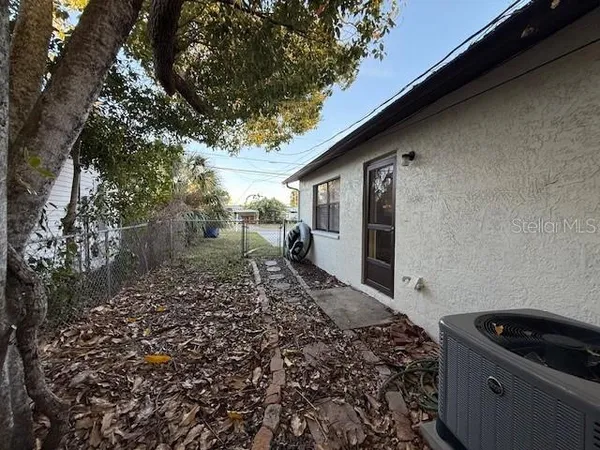 a view of a back yard of the house