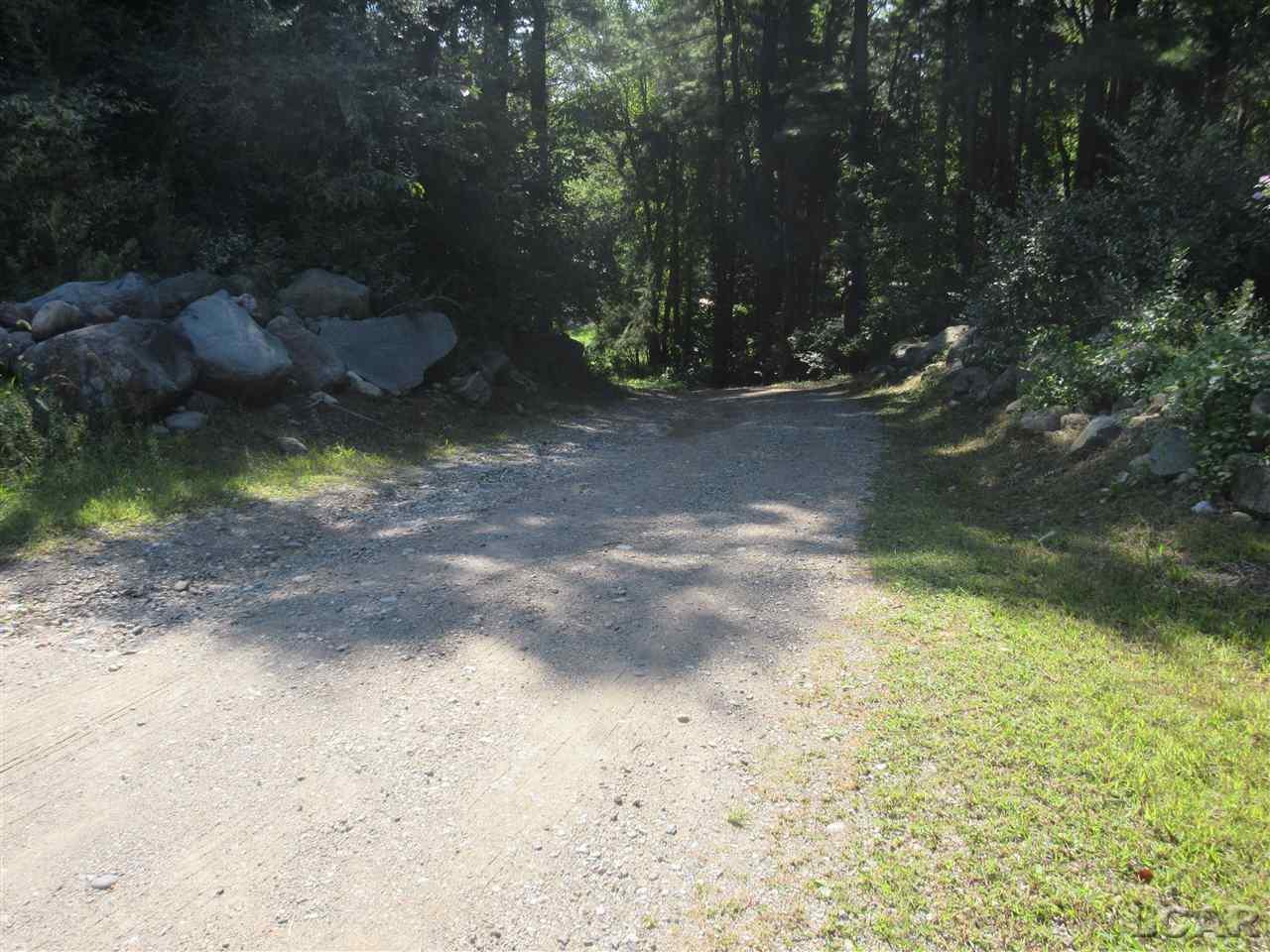 5995 Pawson Road Tipton, MI 49287 - Photo 4 of 53 Driveway by Boulders