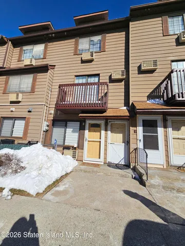 a view of a house with a patio