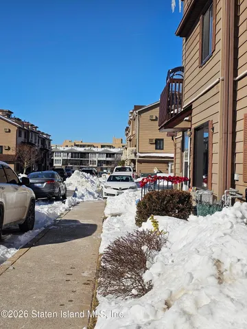 a view of a street with cars