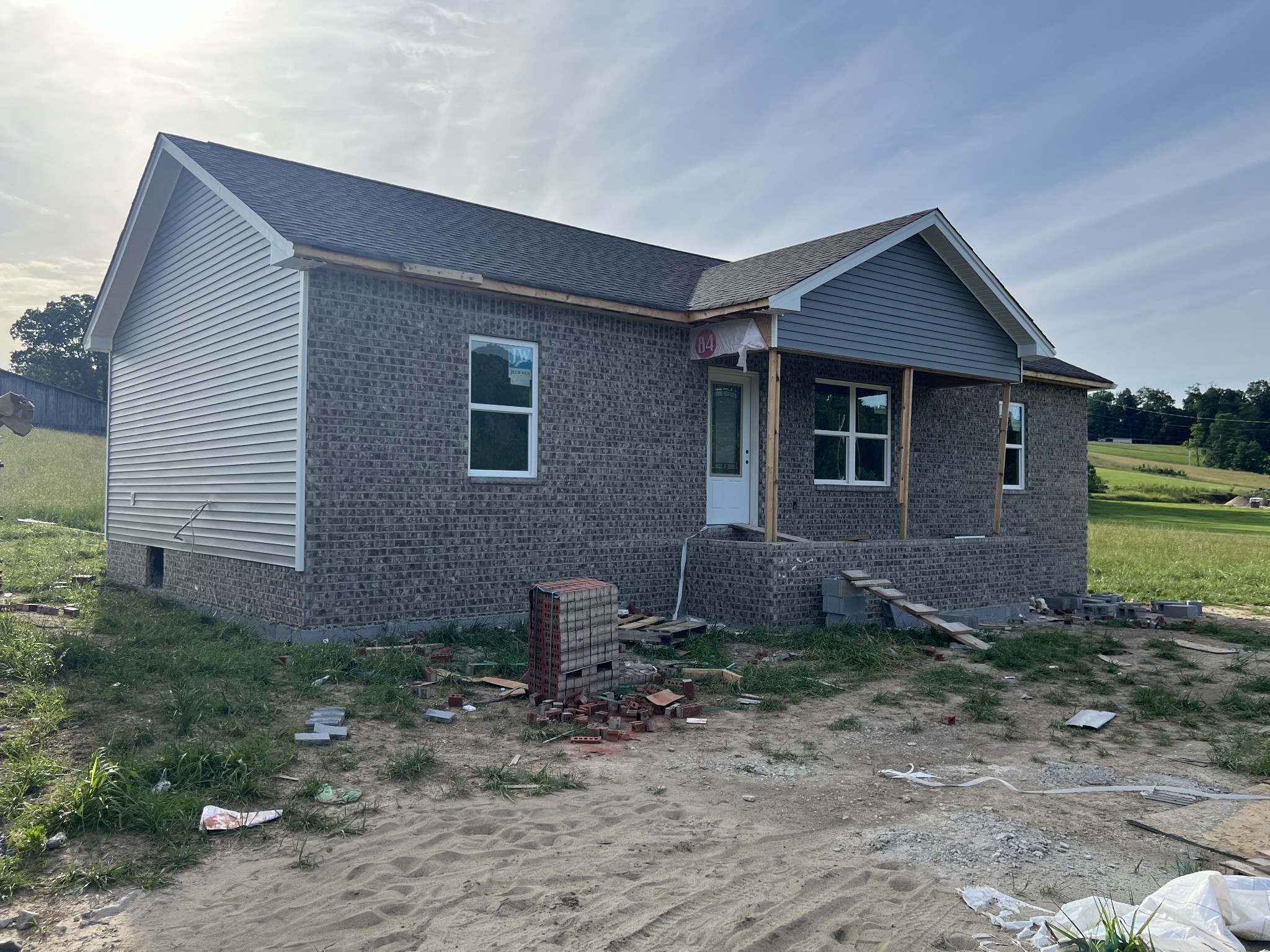 1778 Old Gallatin Road Portland, TN 37148 - Photo 1 of 7 a front view of a house with garden