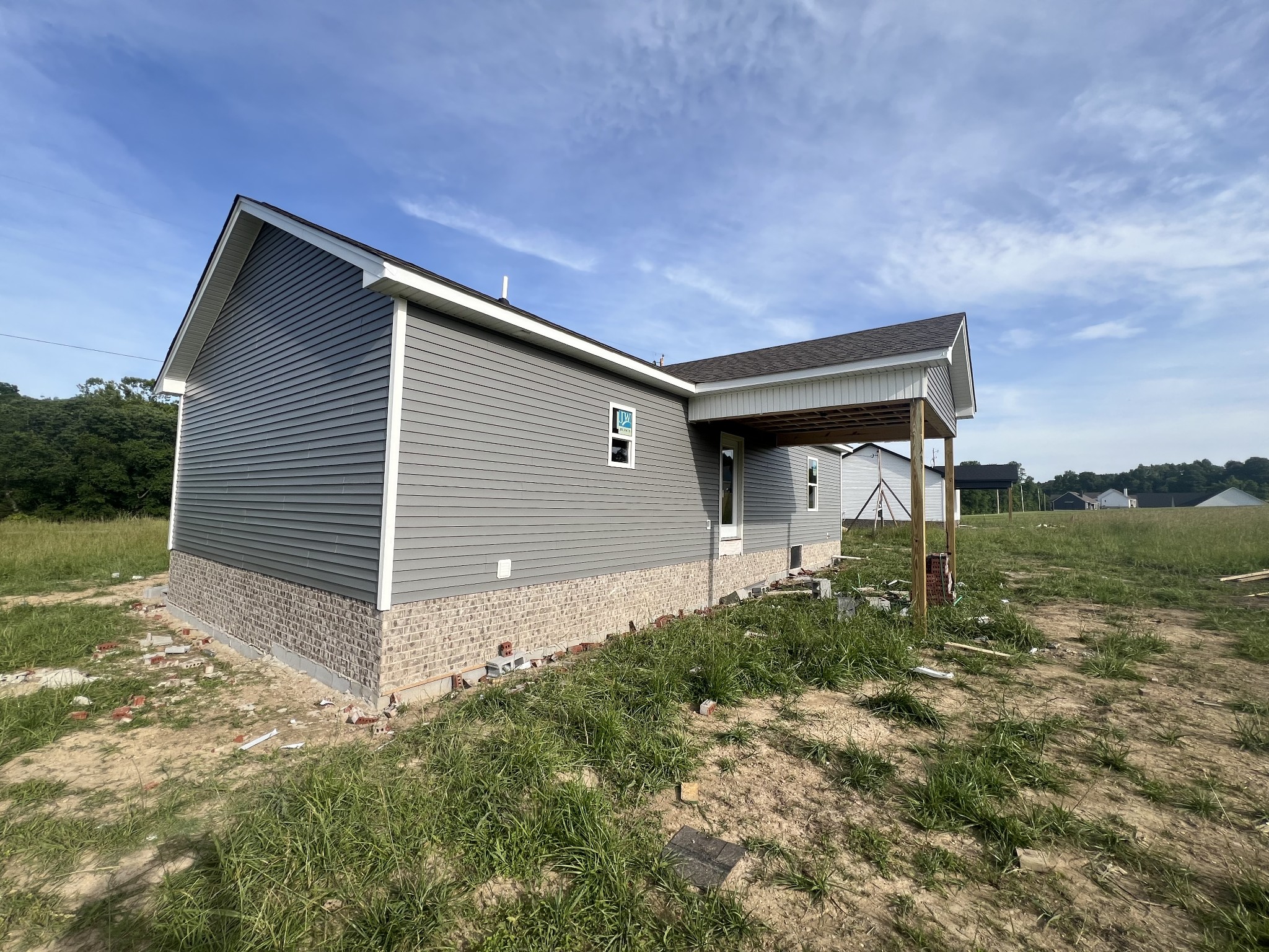 1778 Old Gallatin Road Portland, TN 37148 - Photo 4 of 7 a front view of a house with garden
