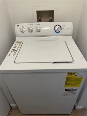 a utility room with washer and dryer