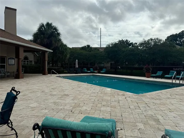 a view of outdoor space yard and swimming pool