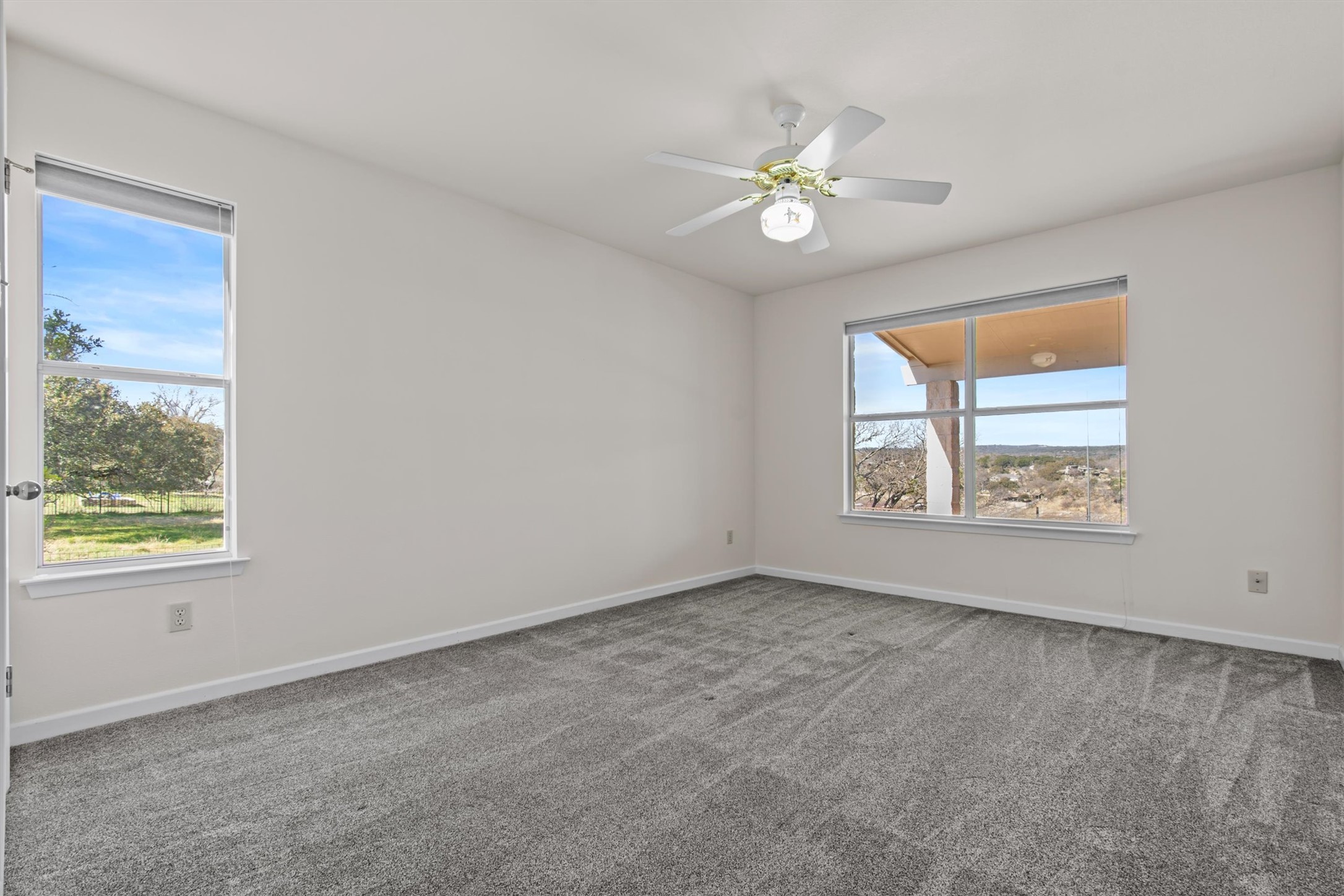 25048 River Road Spicewood, TX 78669 - Photo 15 of 33 Guest bedroom one.