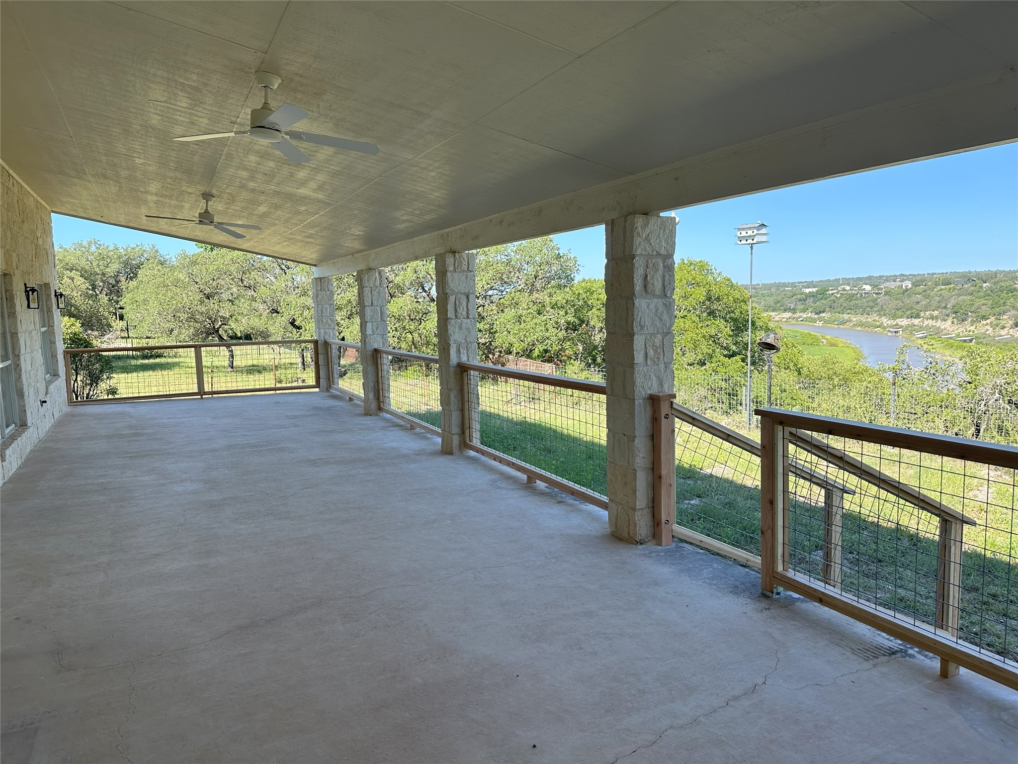 25048 River Road Spicewood, TX 78669 - Photo 19 of 33 View of patio / terrace featuring ceiling fan