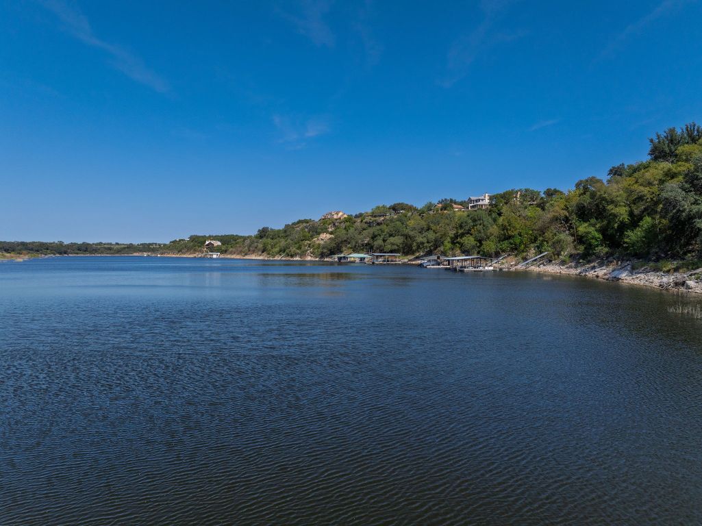 25048 River Road Spicewood, TX 78669 - Photo 32 of 33 a view of lake with mountain in the back