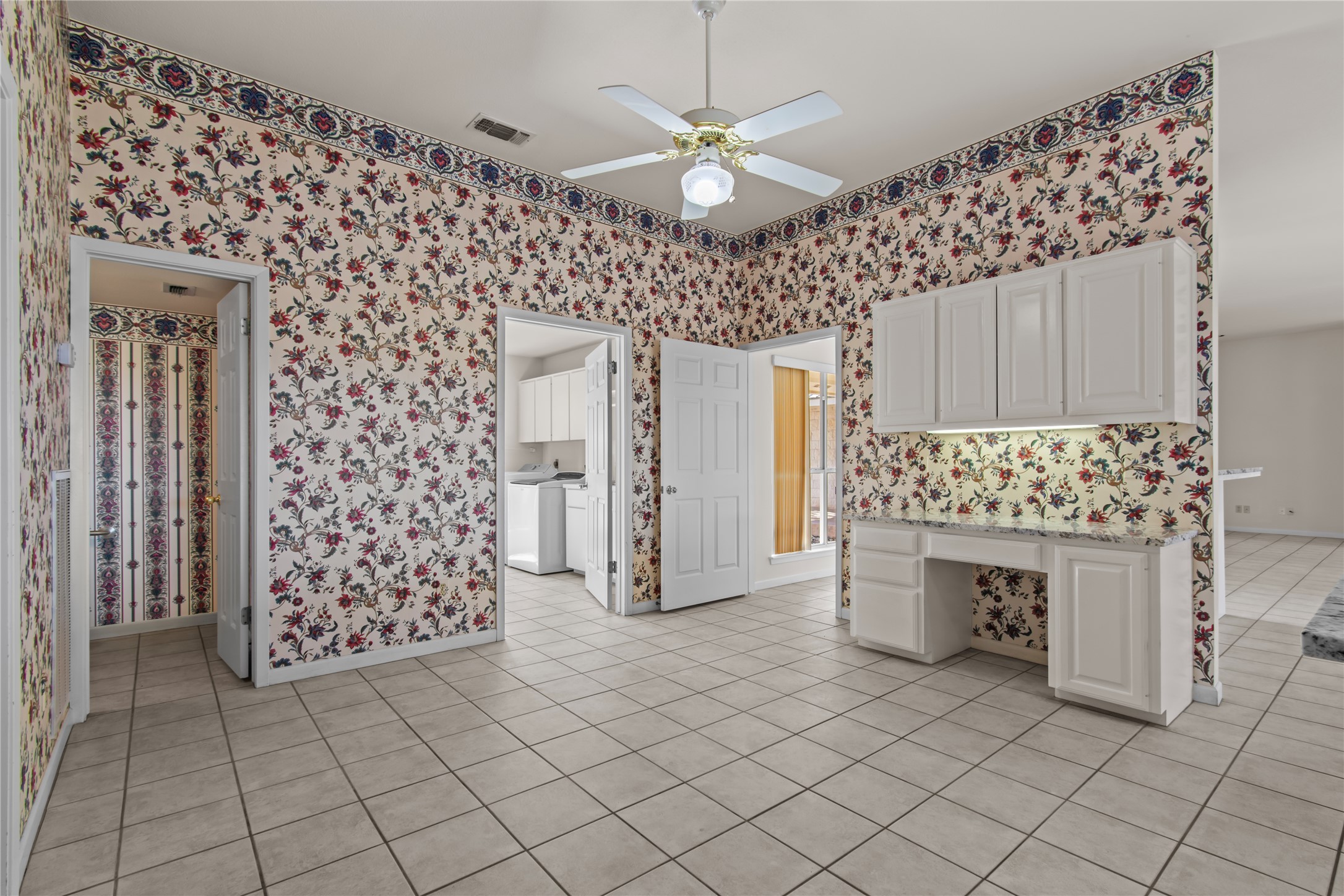 25048 River Road Spicewood, TX 78669 - Photo 8 of 33 Built in desk and storage.