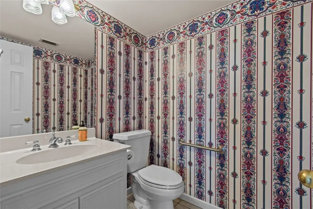 a bed room with a bed and a large window