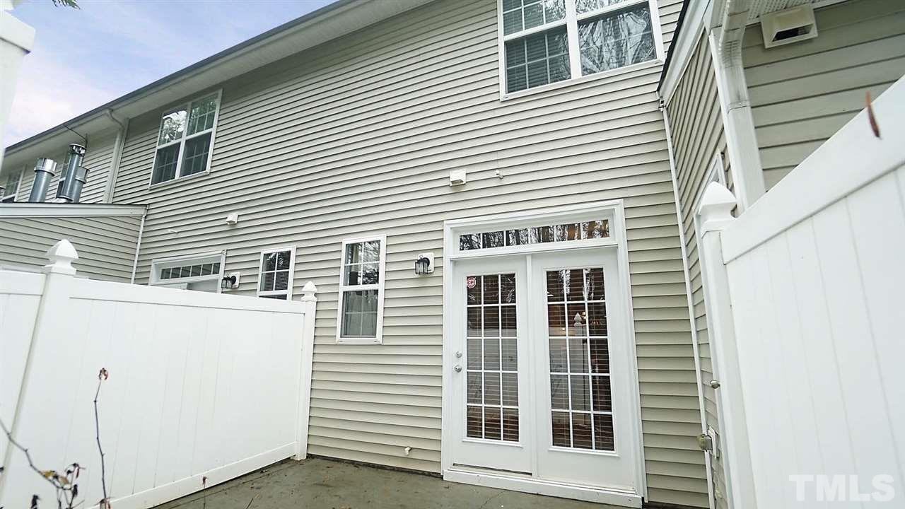 8311 Martello Lane Raleigh, NC 27613 - Photo 29 of 30 a view of a house with white door