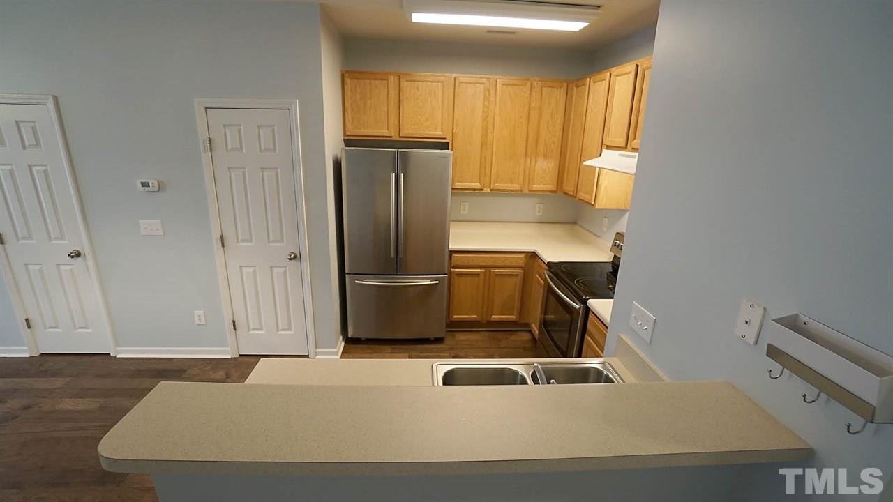 8311 Martello Lane Raleigh, NC 27613 - Photo 7 of 30 a room with a bed and a window