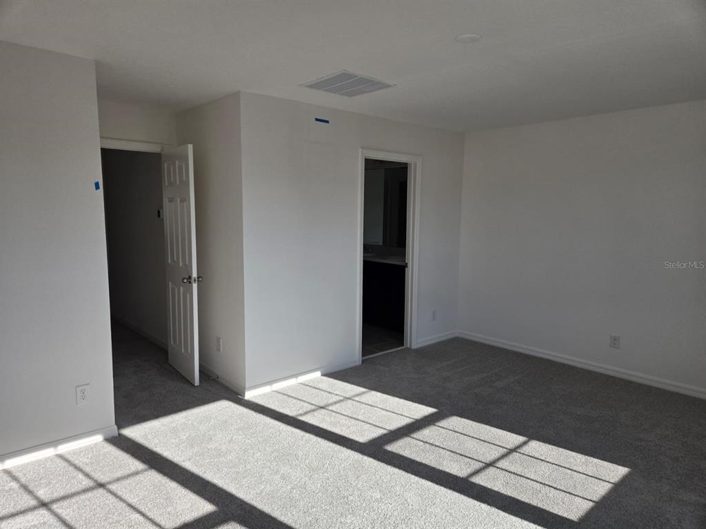 4827 Noble Cypress Street Kissimmee, FL 34746 - Photo 24 of 29 a view of wooden floor