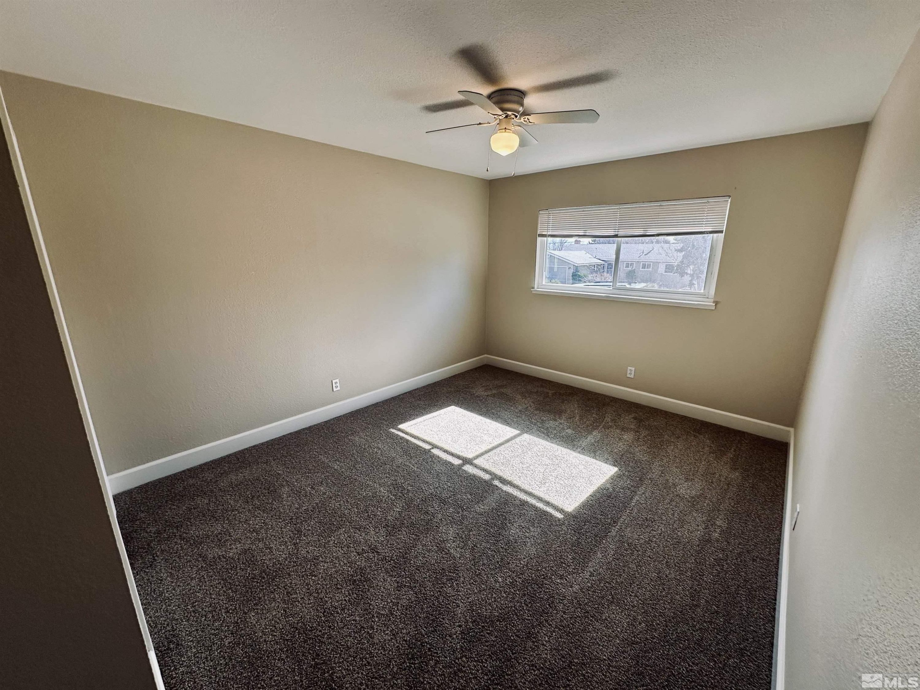 1945 Gridley Avenue Reno, NV 89503 - Photo 16 of 27 an empty room with a window