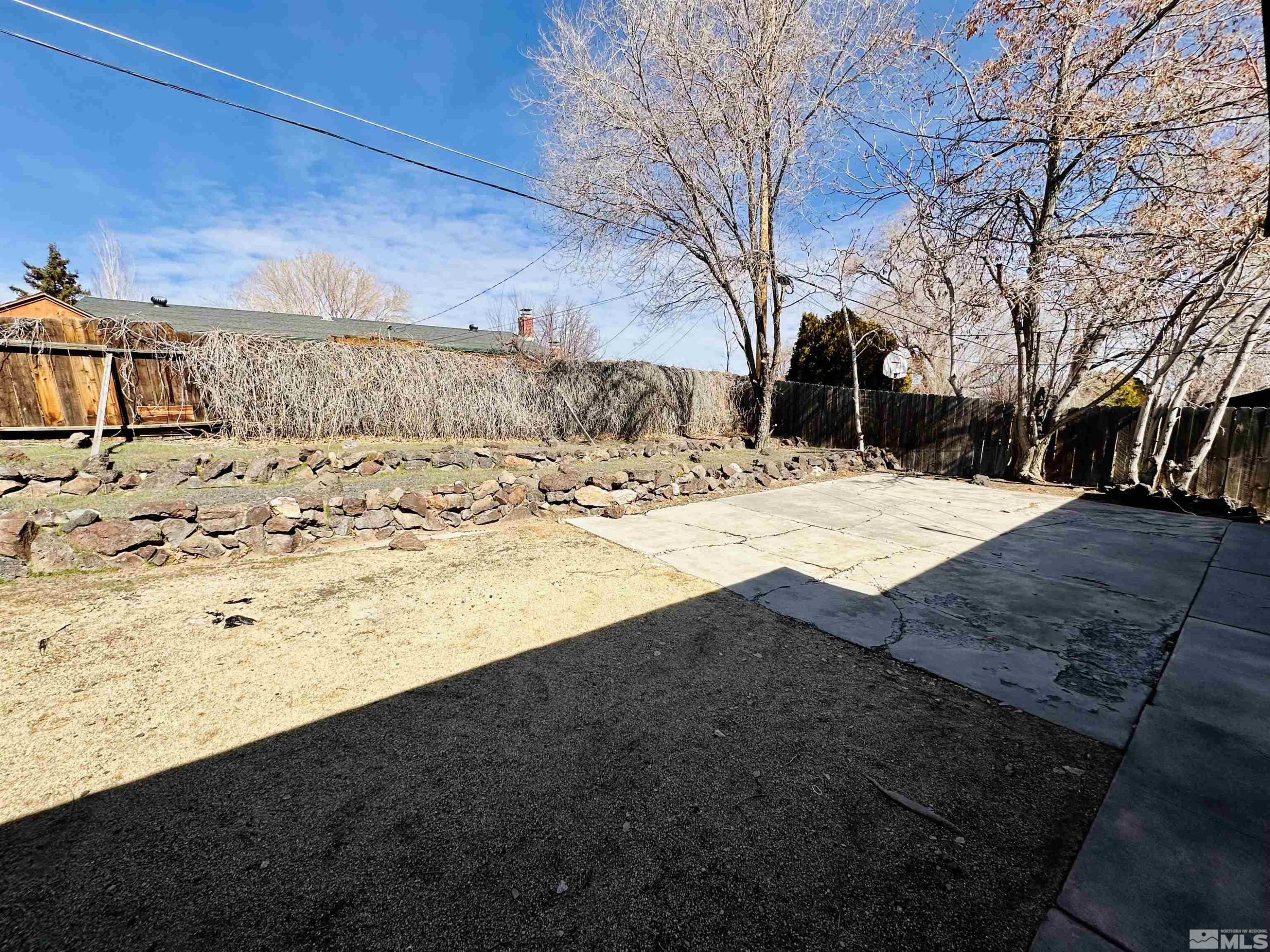 1945 Gridley Avenue Reno, NV 89503 - Photo 23 of 27 a view of a yard with snow on the road