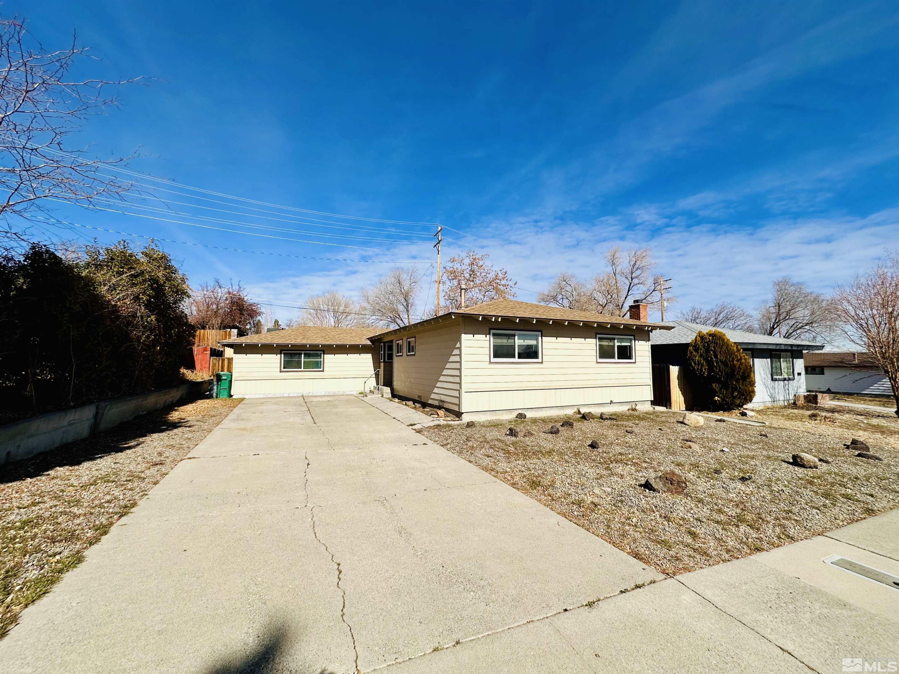 1945 Gridley Avenue Reno, NV 89503 - Photo 27 of 27 a view of a house with a snow in the background