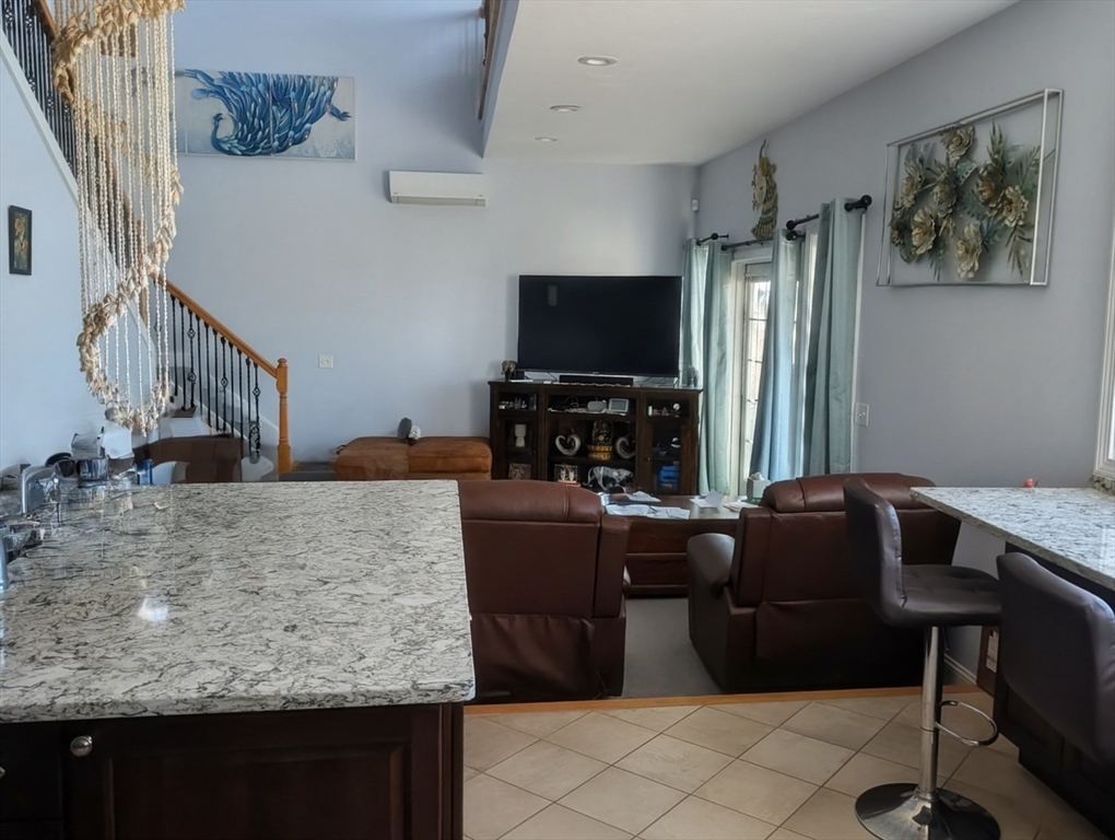 456 Ridge Road Athol, MA 01331 - Photo 9 of 26 a living room with furniture and a flat screen tv