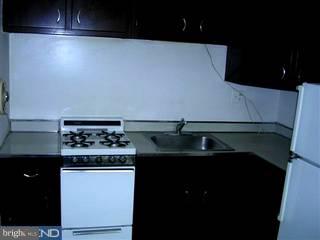 206 Rockingham Road Bryn Mawr, PA 19010 - Photo 6 of 6 a kitchen with a sink and cabinets