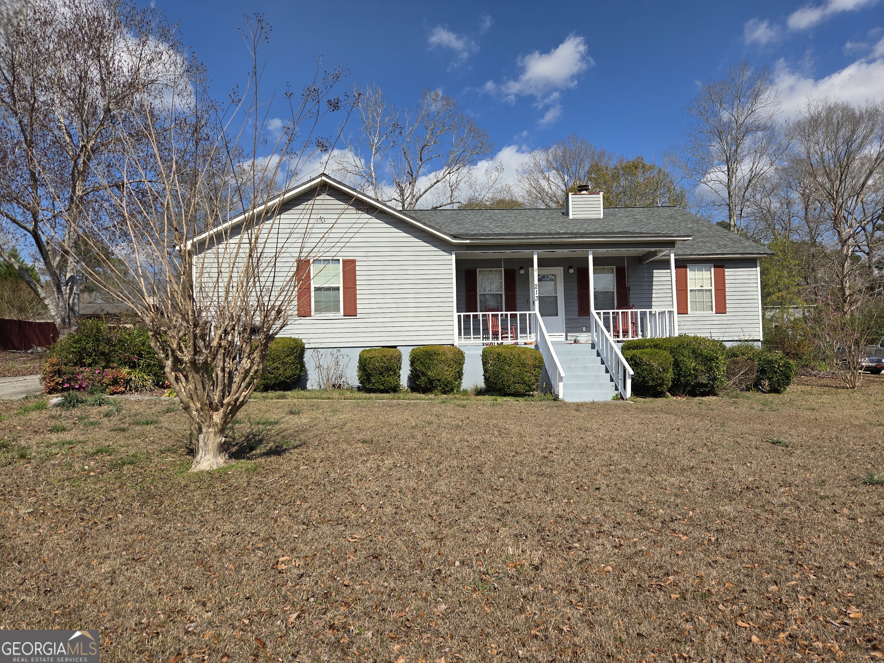 213 Lancelot Lane Dublin, GA 31021 - Photo 1 of 12 a view of a house with backyard and trees