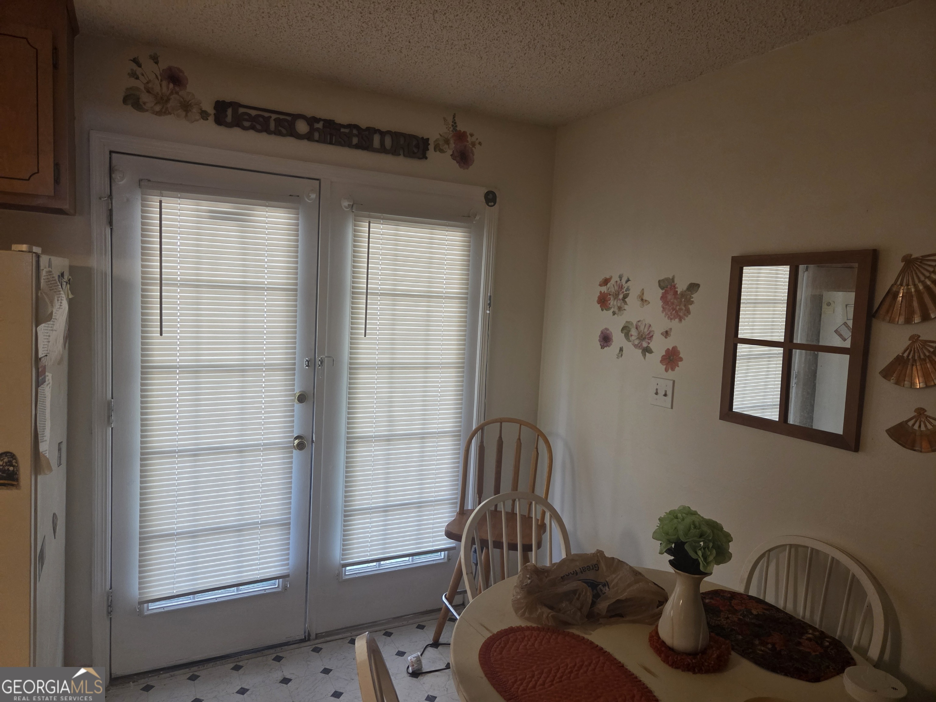 213 Lancelot Lane Dublin, GA 31021 - Photo 11 of 12 a view of a livingroom with furniture and hardwood floor