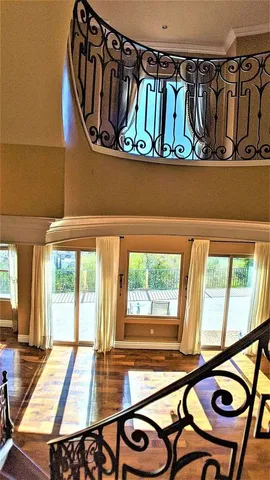 a view of a door and a window in the house