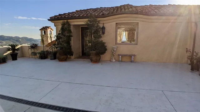 a view of balcony and wooden floor