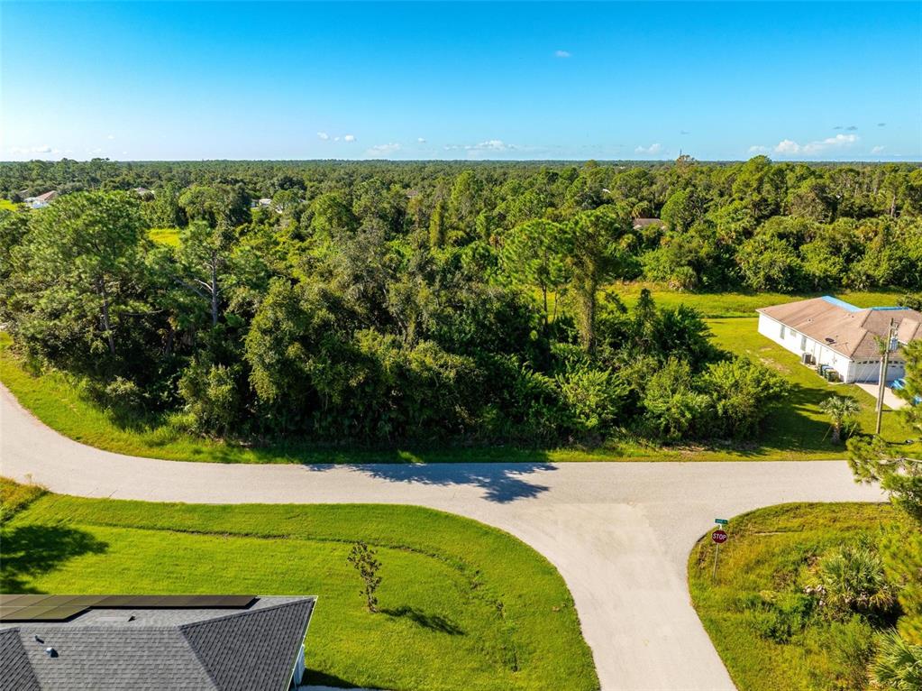 6465 Ohio Rd Port North Port, FL 34291 - Photo 31 of 34 a view of a yard with an outdoor seating