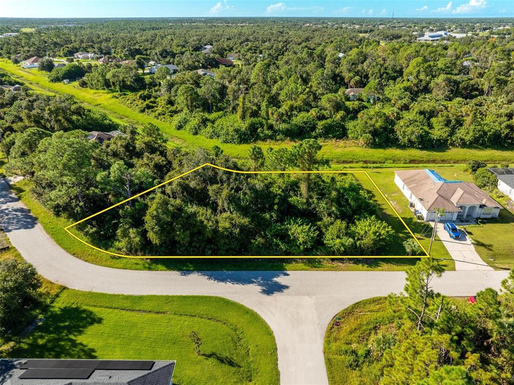 6465 Ohio Rd Port North Port, FL 34291 - Photo 9 of 34 an aerial view of a house