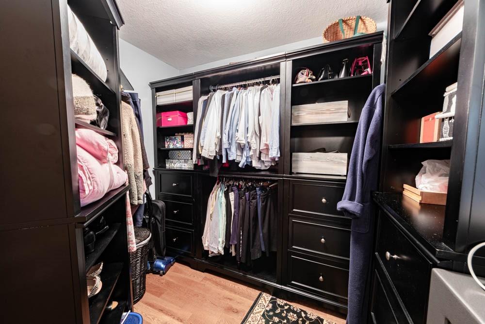 225 Levis Road Portersville, PA 16051 - Photo 11 of 24 a view of walk in closet with clothes and shoes