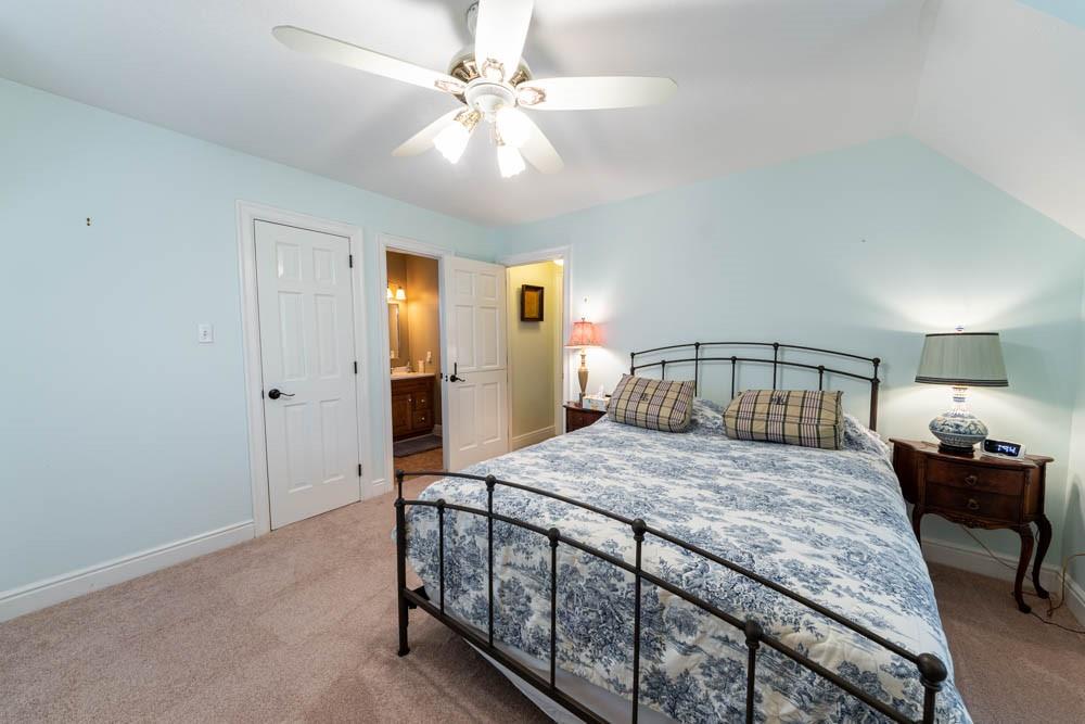 225 Levis Road Portersville, PA 16051 - Photo 14 of 24 a bedroom with a bed a table and chair