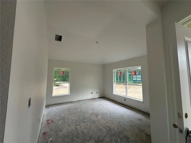 an empty room with windows