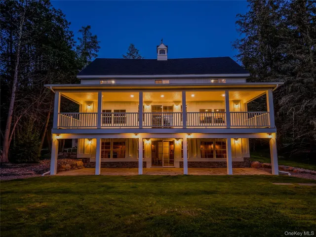 a view of pool with a yard