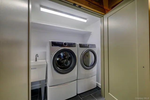 a utility room with dryer and washer