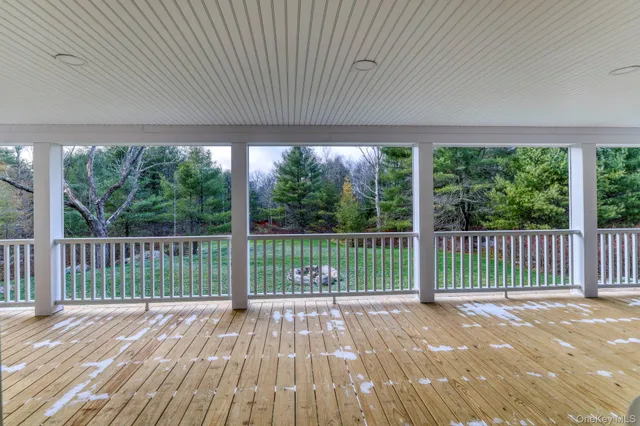 a view of balcony with a flat screen tv